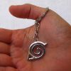 Picture of Naruto konoha necklace/keychain