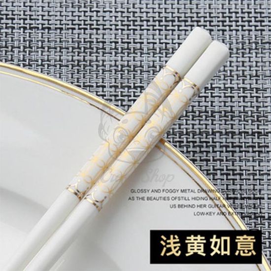 Picture of yellow ceramic chopsticks